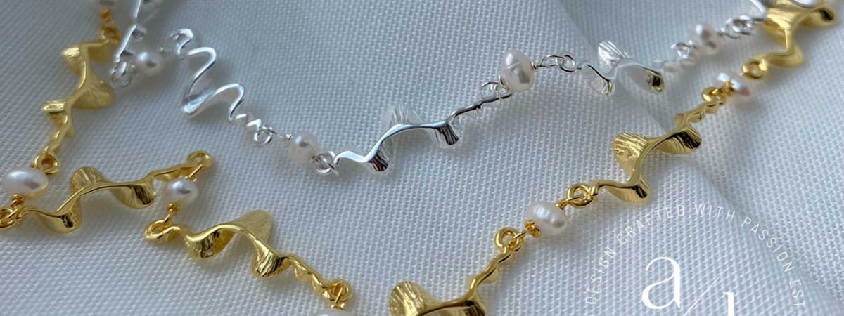 Forgyldt og sølv halskæde med perler