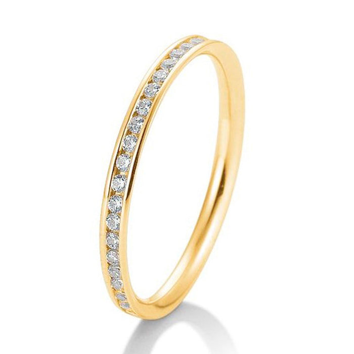 Alliancering i guld med diamanter med kanalfatning