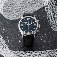 Certina DS 8 Moon Phase herreur med blå skive og læderrem, set forfra