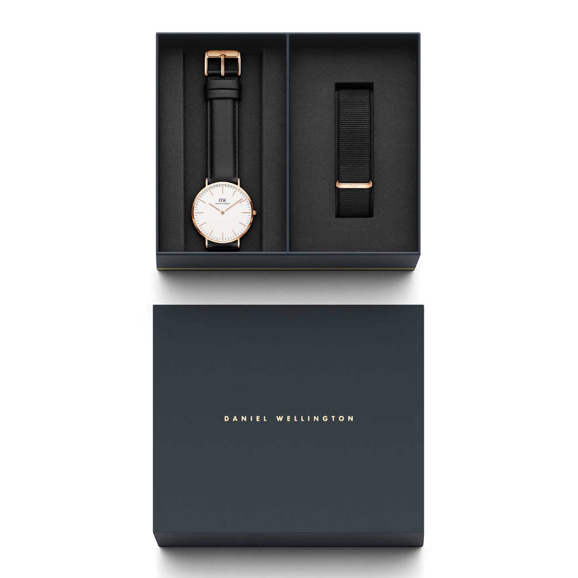Daniel Wellington ur i rosgauld stål med hvid urskive og sort læderrem samt sort nylonrem