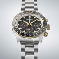 Seiko Prospex ur i stål med sort skive og guld detaljer