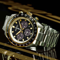 Seiko Prospex ur i stål med sort skive og guld detaljer