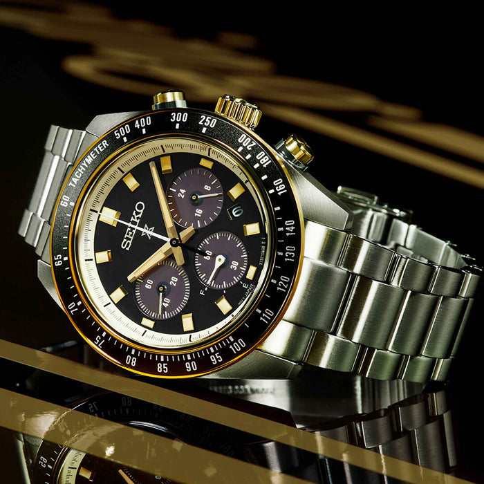 Seiko Prospex ur i stål med sort skive og guld detaljer