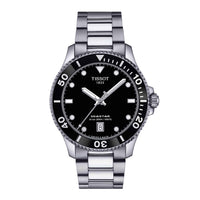 Klassisk dykkerur i stål med sort skive og krans, set forfra