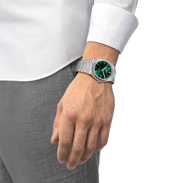 Herreur i børstet stål med grøn skive fra Tissot, på håndled