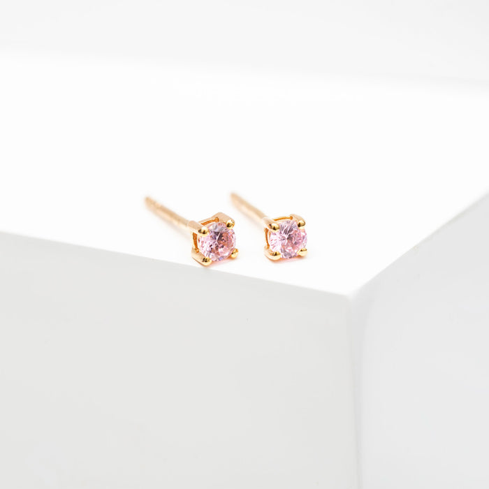 Forgyldte ørestikker med pink zirkonia sten