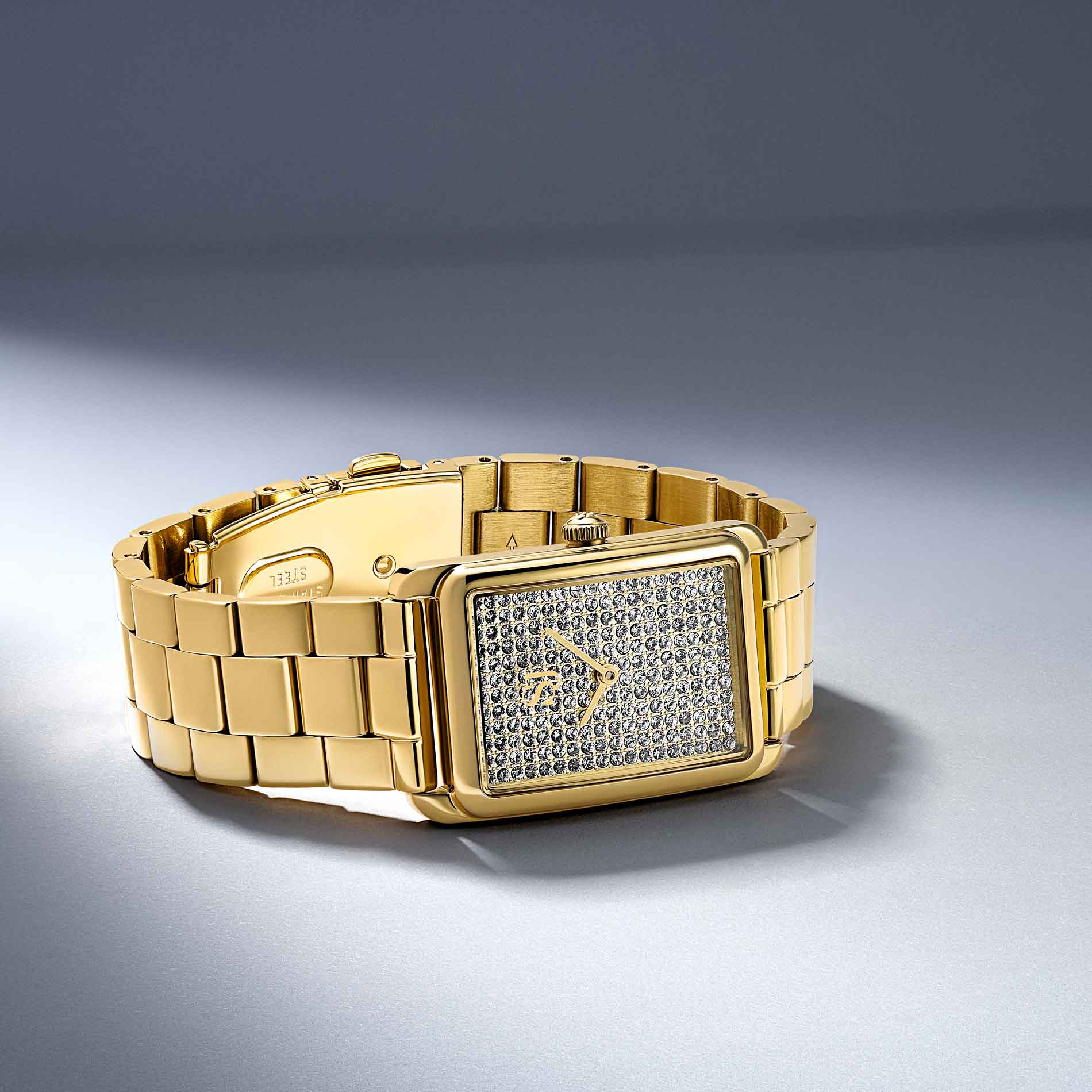 Guldtonet stål ur fra Sif Jakobs med zirkonia på skiven