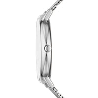 Skagen dameur i rustfrit stål med indeksmarkeringer på urskiven og meshlænke. Uret ses fra siden.