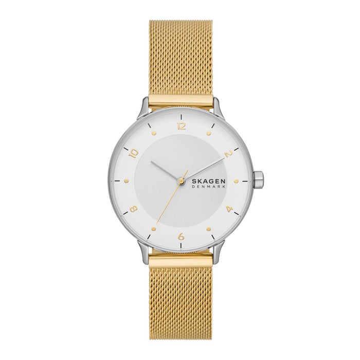 Skagen dameur med urkasse i rustfrit stål og meshlænke i guldtonet stål. Uret har hvid skive med arabertal og sekundviser. Uret ses forfra.