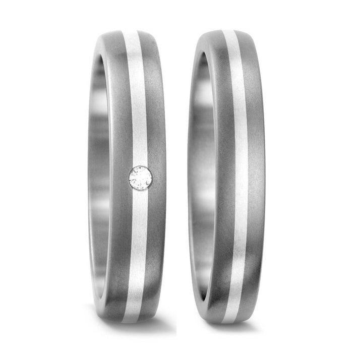 Vielsesringe i titanium og sølv med 1 diamant i den ene ring