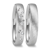 Vielsesringe fra Titan Factory i zirkonium, med 5 diamanter i den ene ring