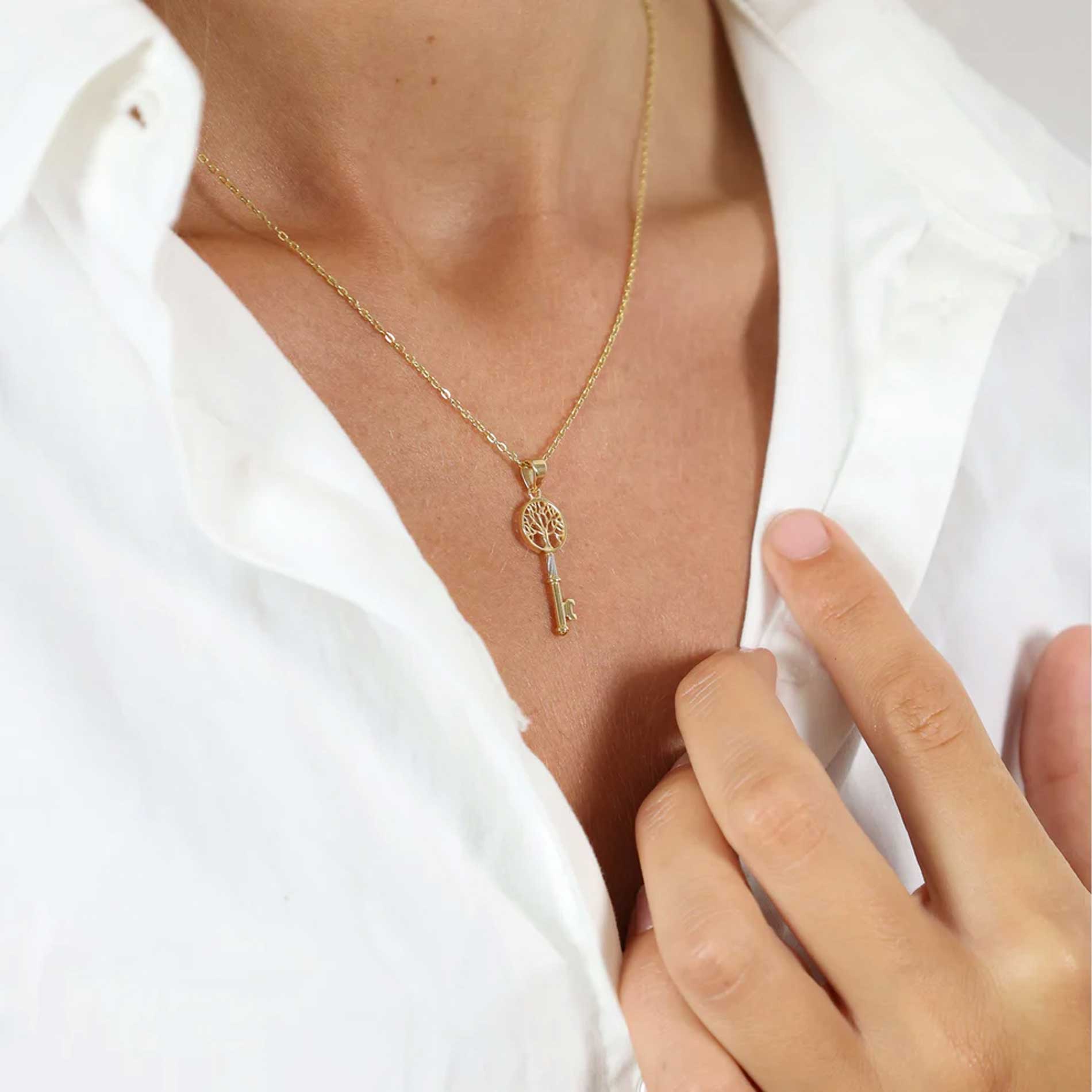 Livets træ nøgle vedhæng i 8 karat guld fra Aagaard