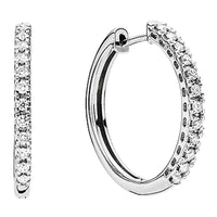 Lund Copenhagen creoler 19 mm med 0,23 ct diamanter i 14 karat hvidguld