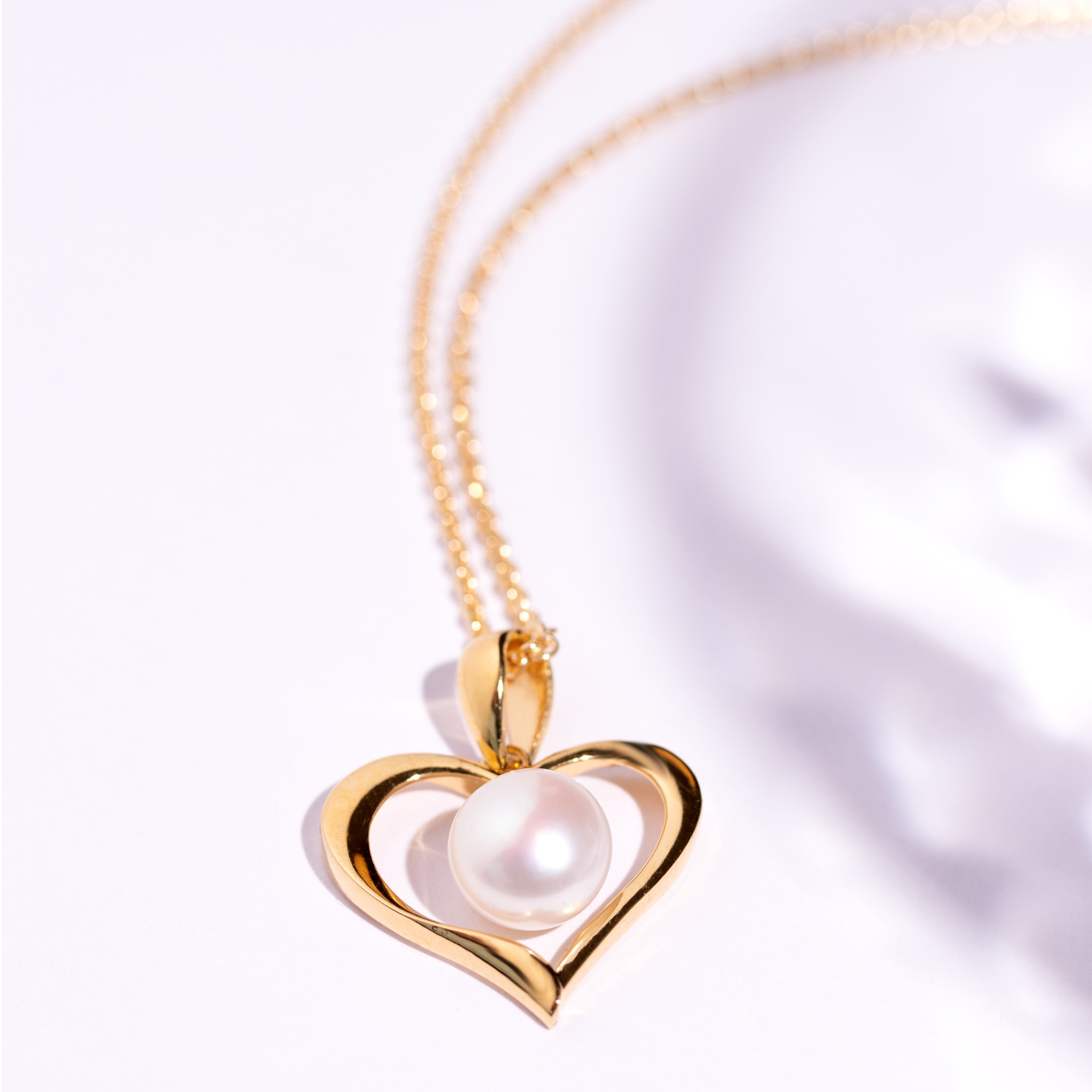Hjertehalskæde med hvid perle