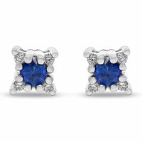 Diamantørestikker i hvidguld med blå safir