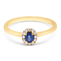 Guldring med blå safir og diamanter