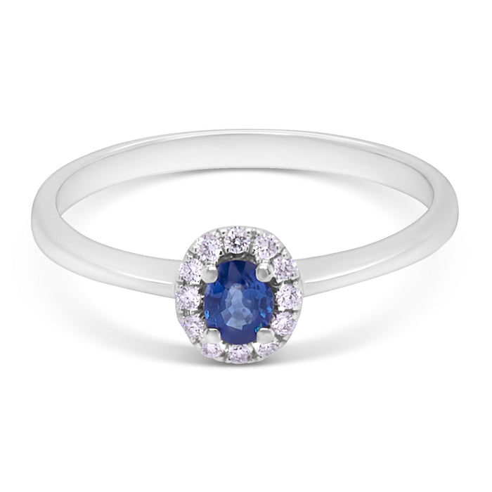Ring i hvidguld med diamanter og en blå safir