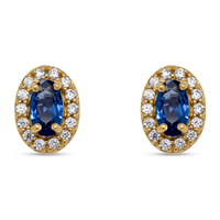 Elina ørestikker i forgyldt sølv med blå og klare zirkonia på hvid baggrund