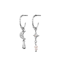 MAANESTEN ØRERINGE I SØLV