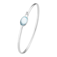 Georg Jensen Torun armring i sterlingsølv med cabochonslebet blå topas