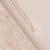 Ocean vedhæng i 18 kt. guld med perle og diamanter