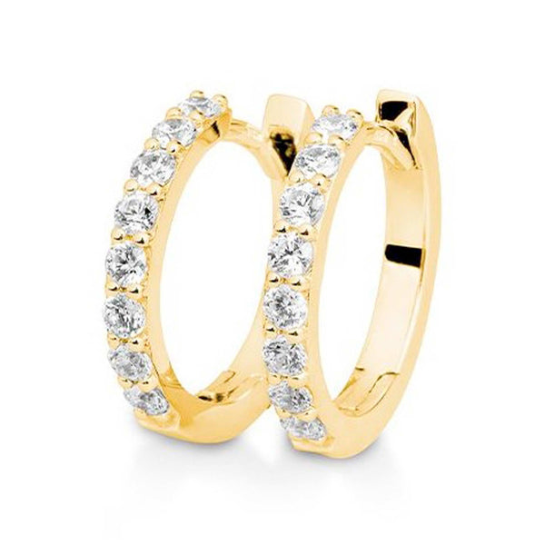 creoler i guld med diamanter i alt 0,48 carat