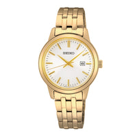 Seiko dameur i guldtonet stål med hvid urskive. Uret ses forfra.