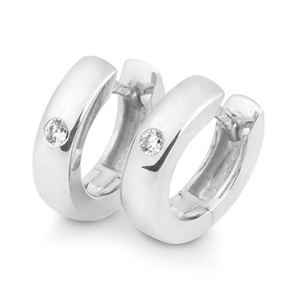 Creoler i hvidguld med en diamant i hver