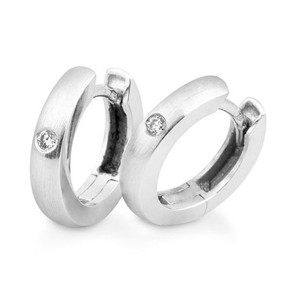 creoler i hvidguld med en diamant i hver