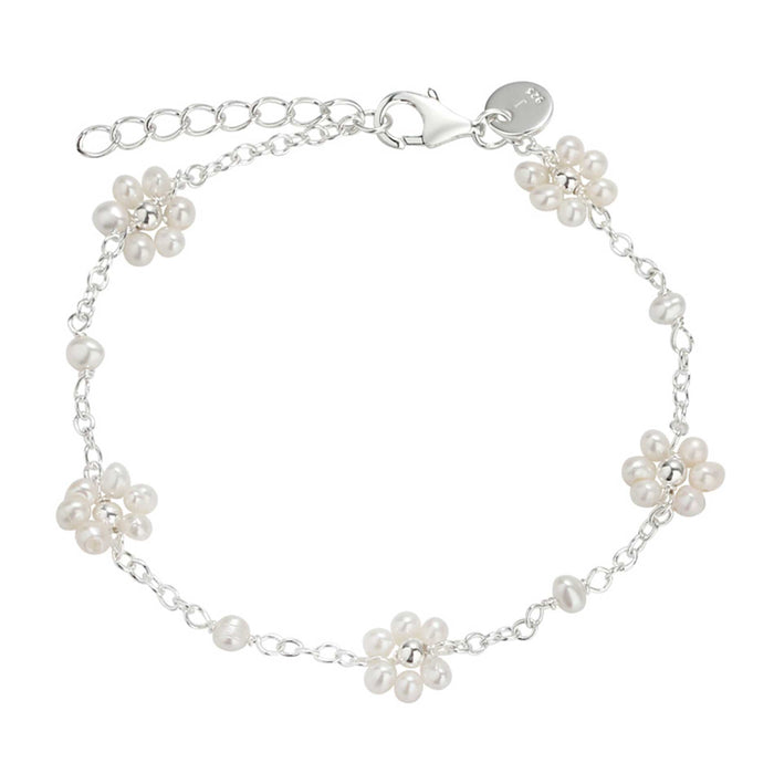 Sølv armbånd med blomster af hvide perler
