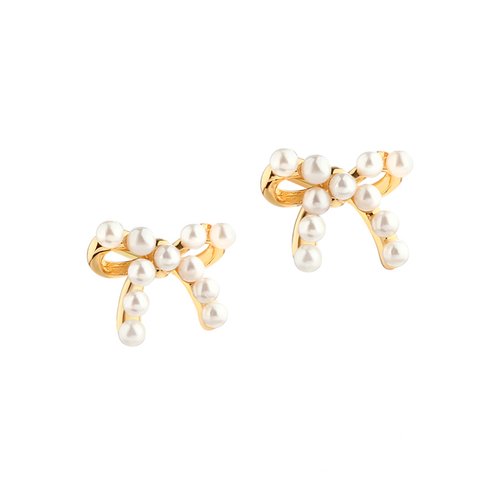 Aqua Dulce Pearly Bow ørestikker i forgyldt 925 sterlingsølv med skalperler formet som sløjfe