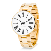 Arne Jacobsen Roman dameur 34 mm model 53307-1629 i vinklet visning med hvid urskive og guldfarvet urkasse