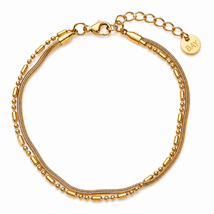 Bay by Aqua Dulce Flowy armbånd i forgyldt stål med bølgende detaljer
