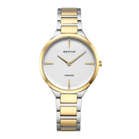 Bering Classic dameur 35 mm model 15634-714 med hvid struktureret urskive, diamantmarkeringer og tofarvet lænke i rustfrit stål