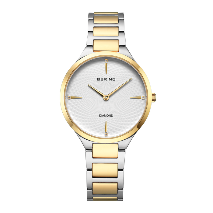 Bering Classic dameur 35 mm model 15634-714 med hvid struktureret urskive, diamantmarkeringer og tofarvet lænke i rustfrit stål