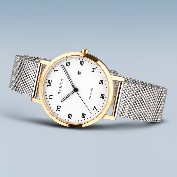 Bering Titanium 34 mm dameur model 18634-010 med hvid urskive og meshrem