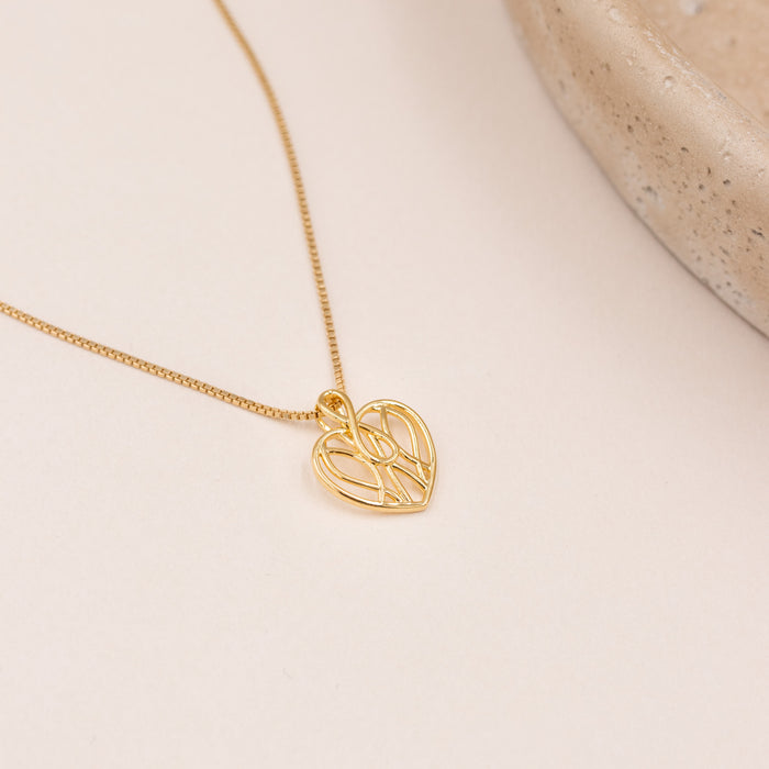 Evighedshjerte vedhæng i forgyldt sølv med åbent hjerteformet design
