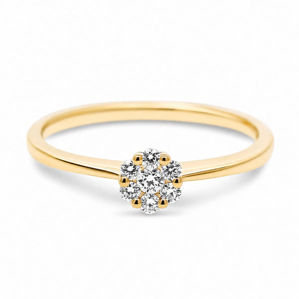 Fleur ring i 18 karat guld med 0,15 carat hvide diamanter i blomsterform, vist som packshot.