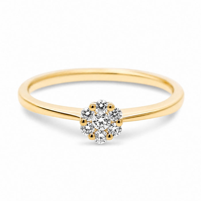 Fleur ring i 18 karat guld med 0,15 carat hvide diamanter i blomsterform, vist som packshot.