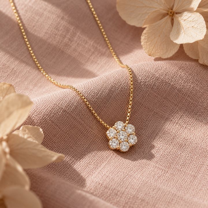 Fleur vedhæng i 18 karat guld, 1,02 ct lagt på bløde stoffer