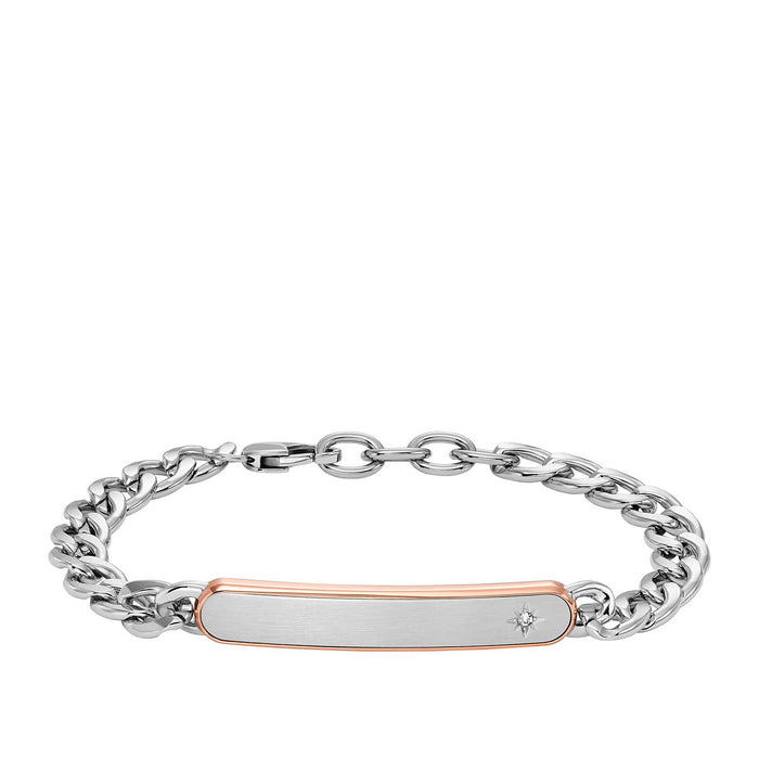 Fossil stålarmbånd med panserled og plade. Pladen er i stål / cognac og har en diskret sten i det ene hjørne. Armbåndet ses forfra.