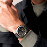 Fossil Machine Chronograph FS6160 båret på håndled med gunmetal stållænke