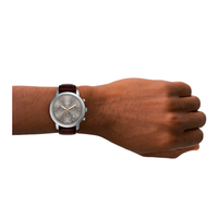 Fossil Neutra FS6129 båret på håndled med brun læderrem