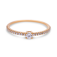 Infinity ring med 0,21 ct. brillantslebne diamanter i 18 kt. guld
