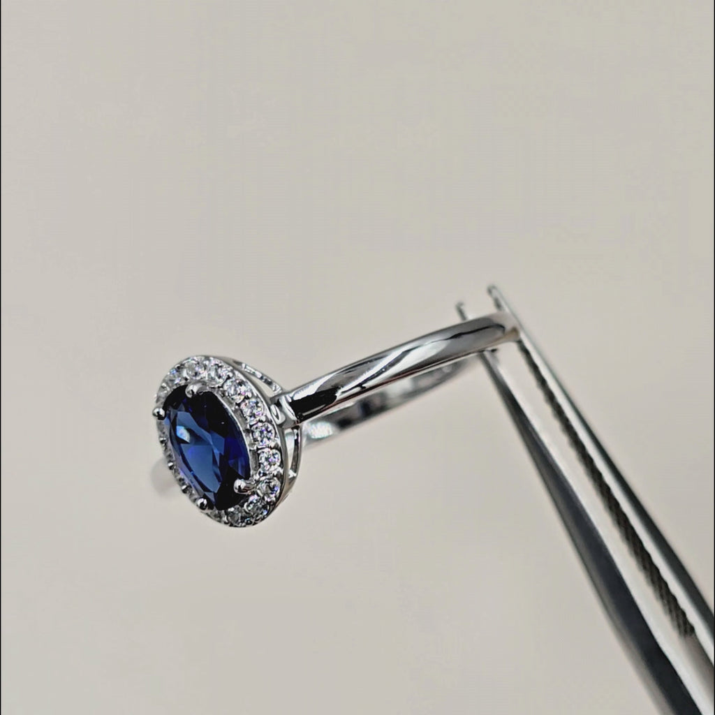 Video af Elina roset ring i sterlingsølv med blå zirkonia