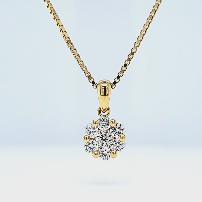 360 graders video af Vedhæng i guld med 7 diamanter fattet i et blomstermotiv