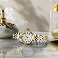 Seiko Classic dameur SUR612P1 i stål med guldfarvet krans, romertal og tofarvet stållænke