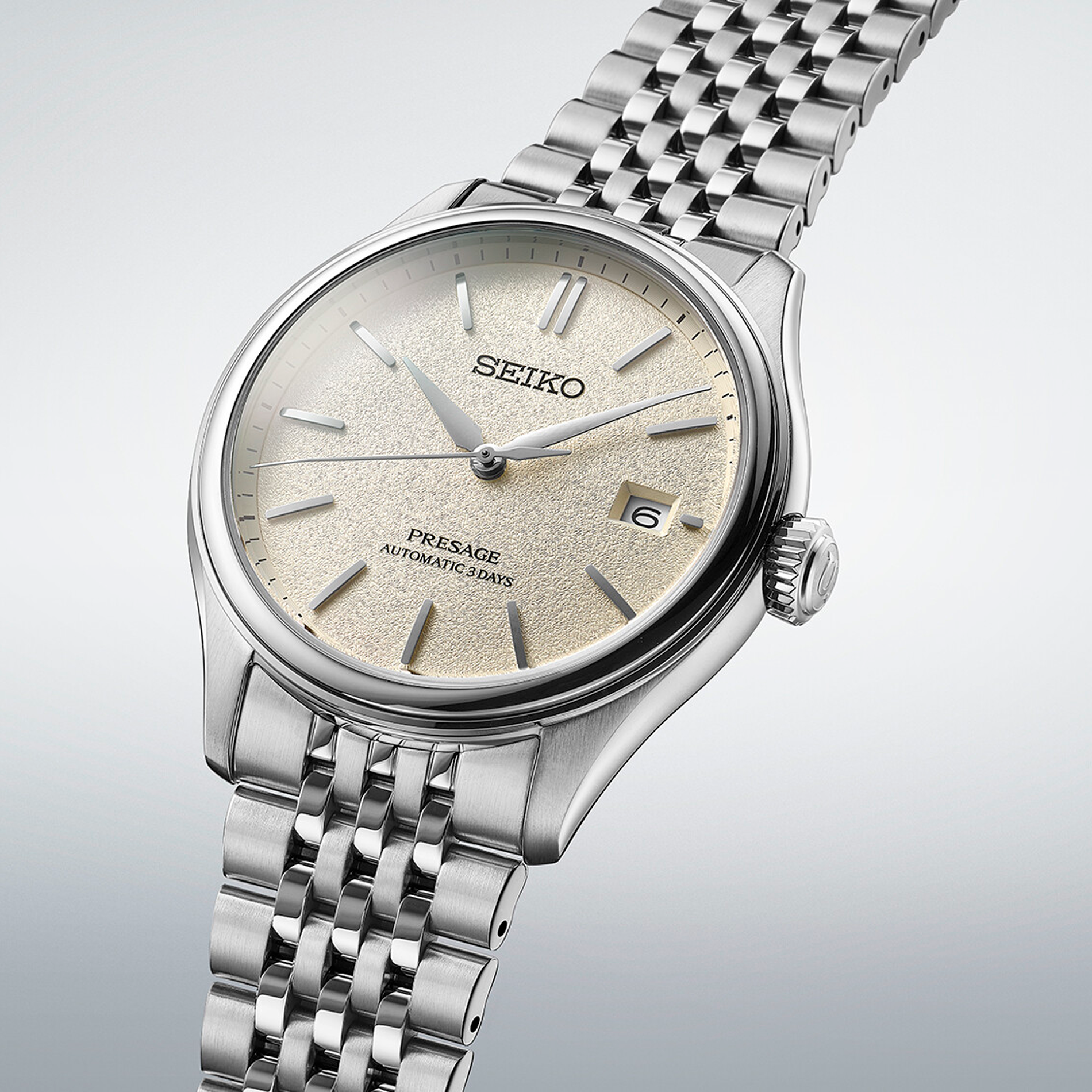 Seiko Presage Automatic Classic SPB463J1 med champagnefarvet tekstureret urskive og stållænke