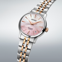 Seiko Presage Cocktail SRPM06J1 dameur med rosa perlemorsskive og tofarvet stållænke