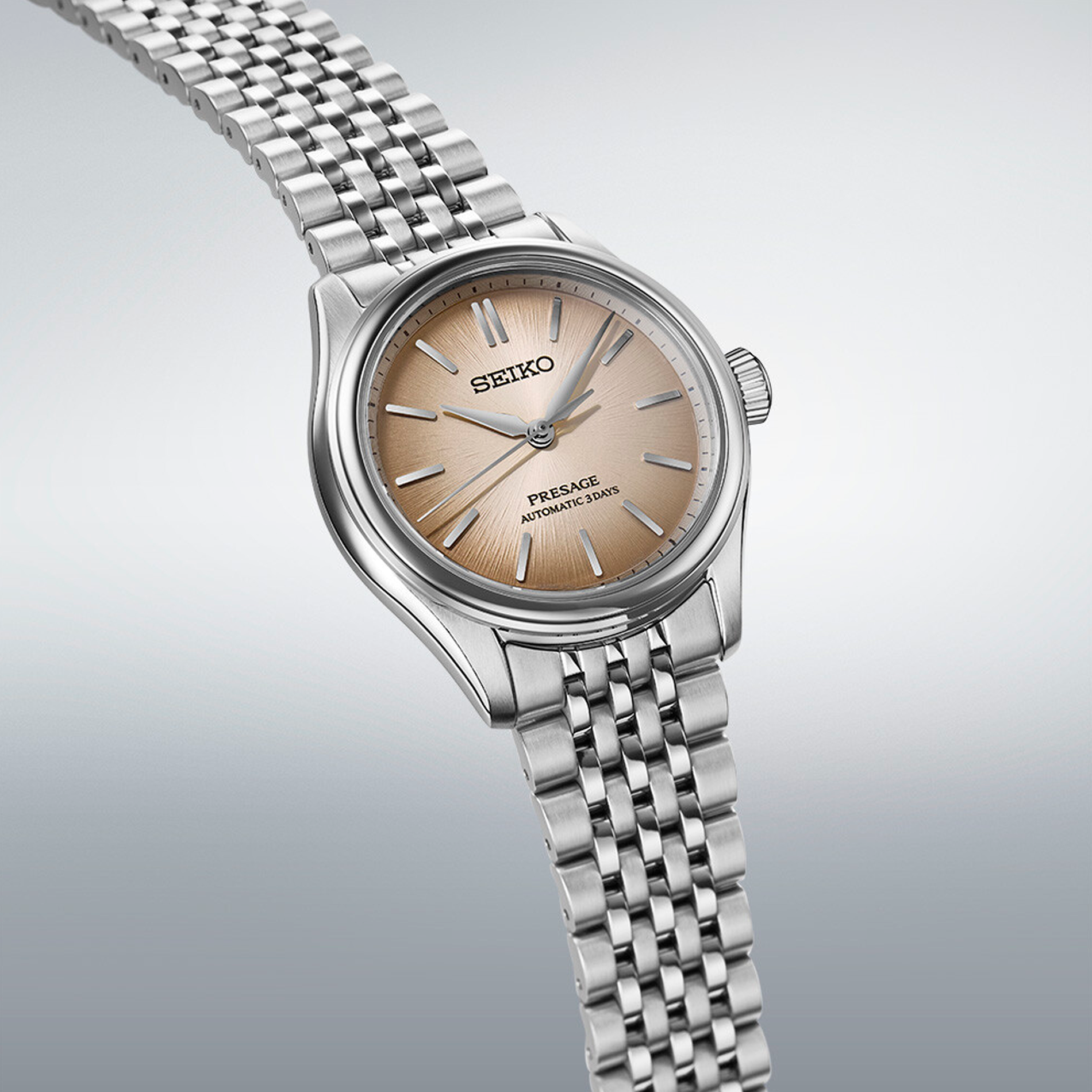Seiko Presage SPB523J1 med champagnefarvet urskive og stållænke